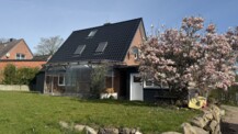Saniertes und modernes Einfamilienhaus auf sonnigem Grundstück in Feldrandlage