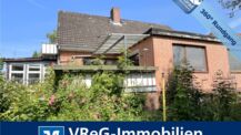 Vollunterkellertes Einfamilienhaus mit Einliegerwohnung und zwei Garagen