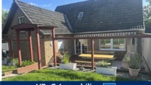 Bad Oldesloe: Älteres Einfamilienhaus mit großer Terrasse und Garage in ruhiger Wohnlage (A 3733)