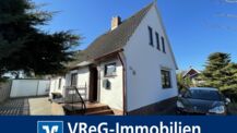 Ruhig gelegenes Einfamilienhaus mit zwei Garagen in Barmstedt zu verkaufen